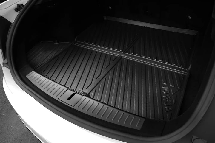 Model S trunk liner with raised edges