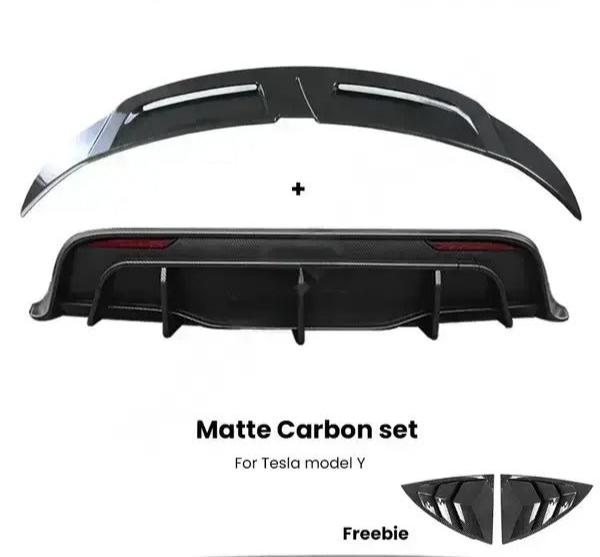 Rear Bumper Diffuser Lip Chin Spoiler Body Kit Black Carbon Look with Tow Hitch Support Tuning Parts for Tesla Model Y 2021-2023 is available at Ludicrous EV.