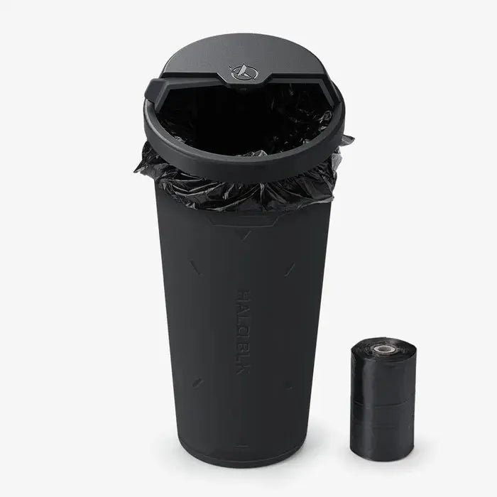 Open Tesla trash can with trash bag roll