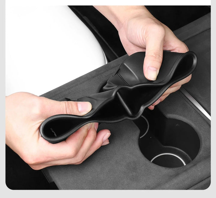 Shock-Absorbing Anti-Skid Silicone Cup Holder Cover for Tesla Model 3/Model Y 2021-2023 is available at Ludicrous EV.
