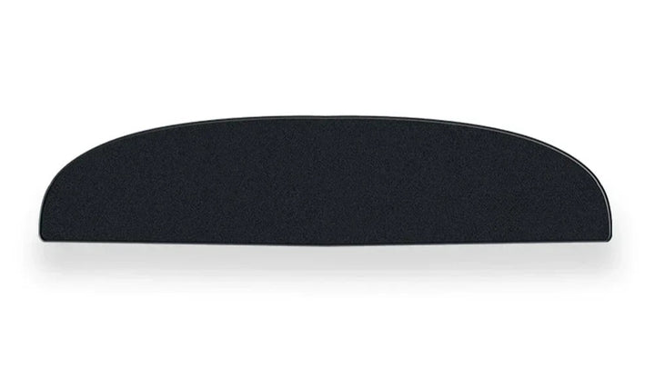 A black flocking trunk mat designed for the Tesla Model 3, placed inside the trunk of the car highlighting its fit and design.