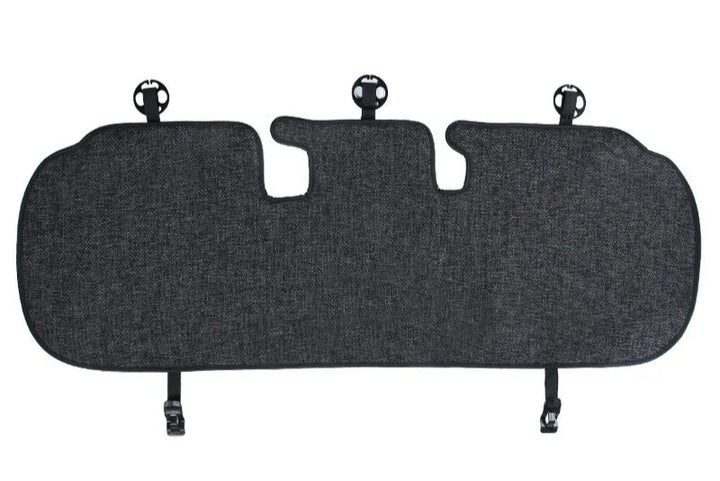 Flax seat pad covers installed on the front and rear seats of a Tesla Model Y, showcasing the product's design and fit.