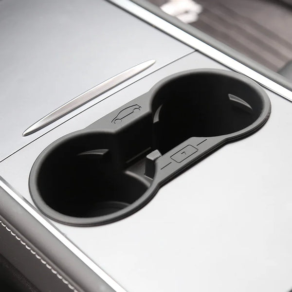 Silicone Non-Slip Cup Holder and Phone Limiter for Central Console for Tesla Model 3 Y 2021-2023 is available at Ludicrous EV.
