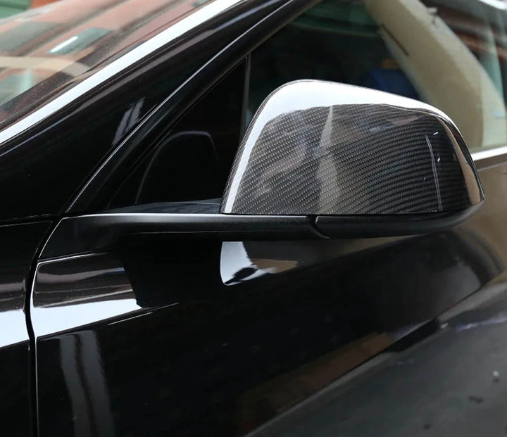 Gloss Black Carbon Fiber Mirror Caps Replacement Style for Tesla Model Y (2019-Up) is available at Ludicrous EV.