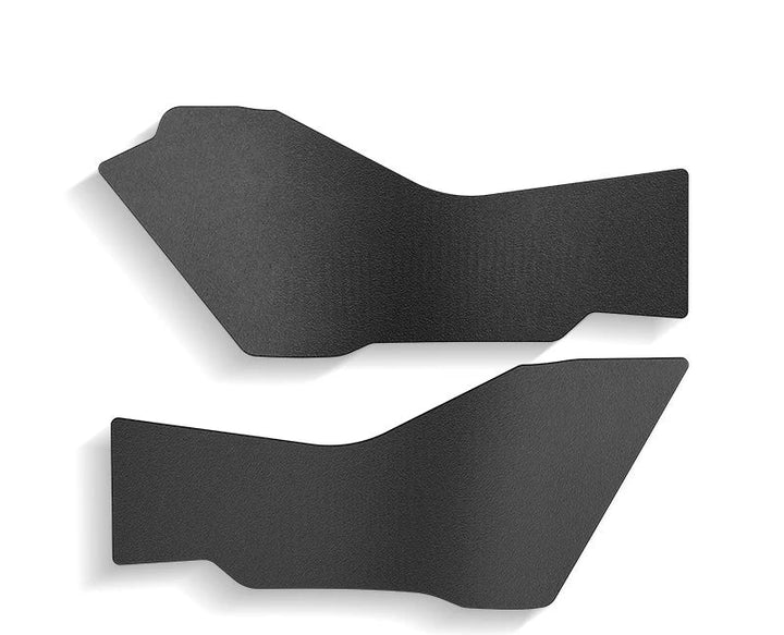 A set of black TPE door sill pads designed for the Tesla Model 3, displayed in various positions around the vehicle's door threshold.