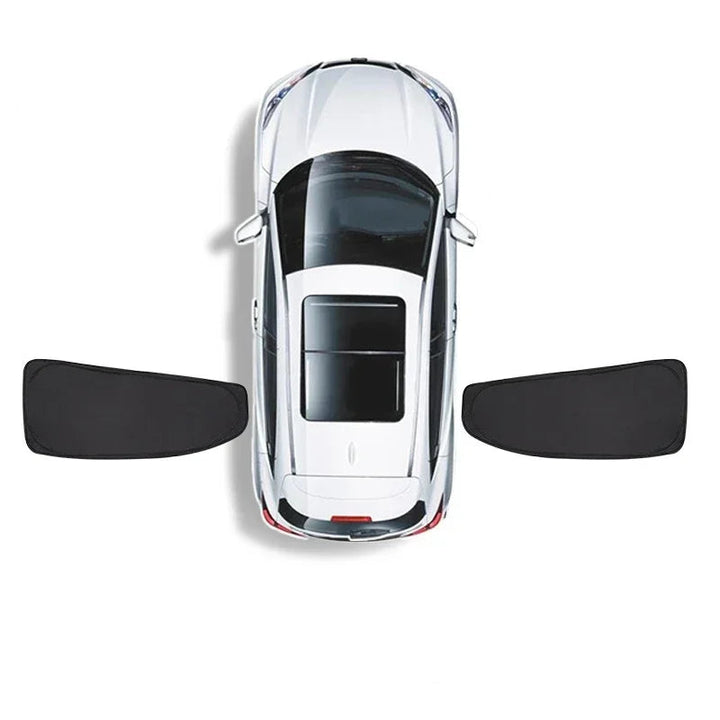 Car window sunshades installed on the interior windshield of a Tesla Model 3, showing the product in use within the vehicle's interior.