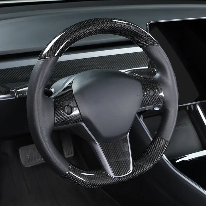 Real Carbon Fiber Steering Wheel Cover for Tesla Model 3/Model Y is available at Ludicrous EV.
