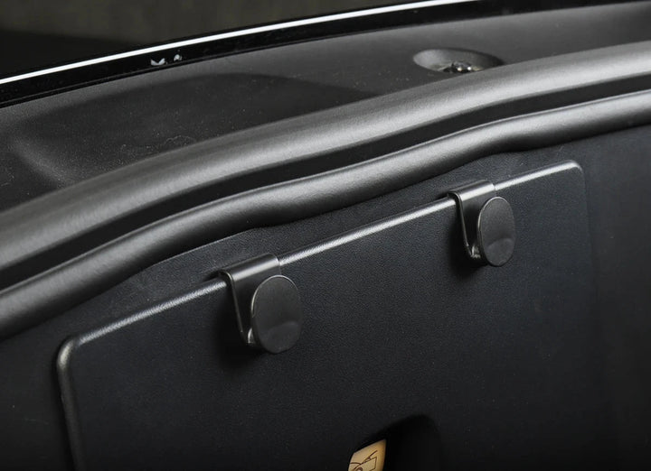 Get the Front Trunk Organizer Hook for Tesla Model 3/Y 2023 at Ludicrous EV, your #1 source for Tesla accessories. Maximize Your Tesla Model 3/Y 2023’s Storage Space - Keep your Tesla Model 3/Y 2023’s front trunk organized and clutter-free with our practical storage hook. This innovative accessory provides additional hanging storage for bags, keys, and other small items, maximizing your vehicle’s storage capacity.