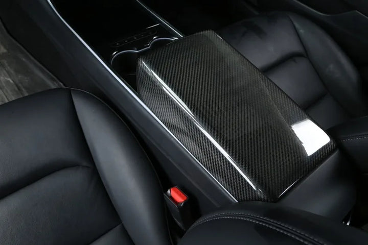 Handmade 3K 240G Carbon Fiber Armrest Shell for Tesla Model 3 Y 3+ which is available at Ludicrous EV.