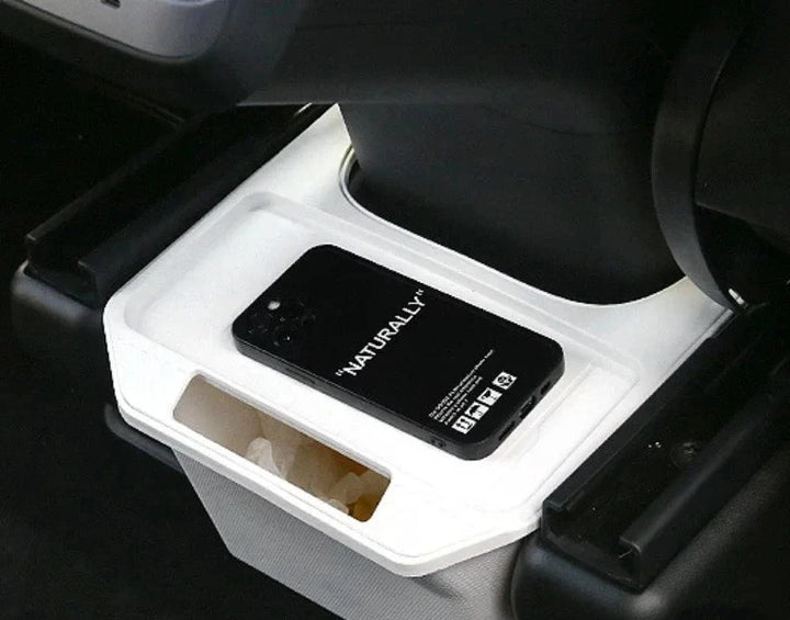 TPE Under-Seat Storage Box with Trash Can for Tesla Model Y 2021-2024 is available at Ludicrous EV.
