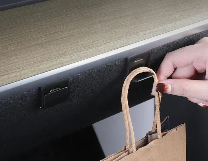 Space-Saving Foldable Glove Box Hook for Tesla Model 3/Model Y is available at Ludicrous EV.
