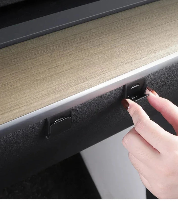 Space-Saving Foldable Glove Box Hook for Tesla Model 3/Model Y is available at Ludicrous EV.
