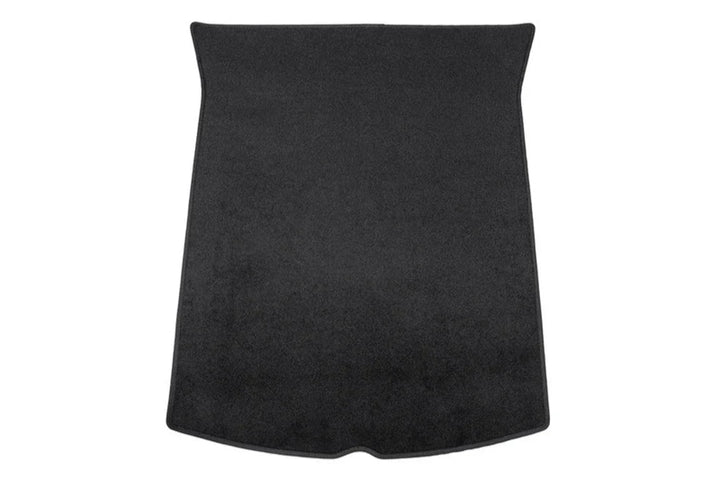A black flocking trunk mat designed for the Tesla Model 3, placed inside the trunk of the car highlighting its fit and design.