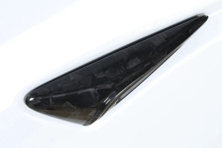 Real Carbon Fiber Side Camera Cover for Tesla Model 3 Highland 2024 is available at Ludicrous EV.