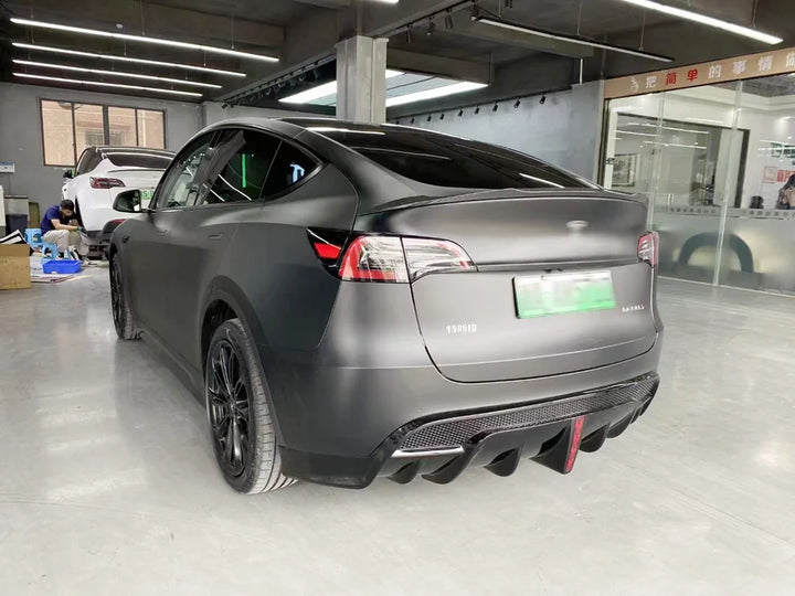 Performance Rear Diffuser with Pilot Light for Tesla Model Y (2021-2023) is available at Ludicrous EV.