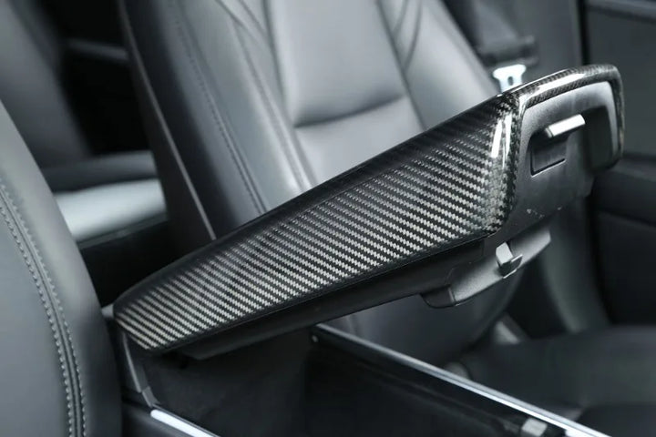 Handmade 3K 240G Carbon Fiber Armrest Shell for Tesla Model 3 Y 3+ which is available at Ludicrous EV.