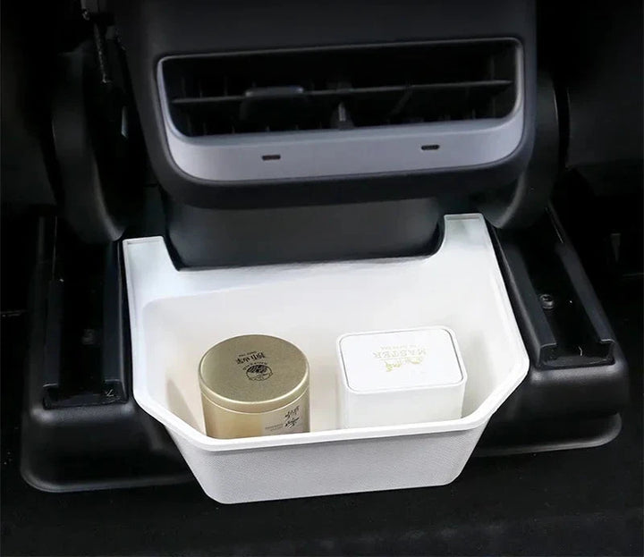 TPE Under-Seat Storage Box with Trash Can for Tesla Model Y 2021-2024 is available at Ludicrous EV.
