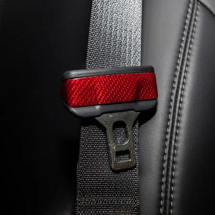 Real Carbon Fiber Seatbelt Buckle Covers for Tesla Model 3/Y is available at Ludicrous EV.
