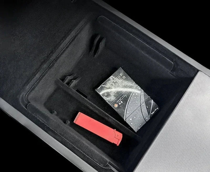 Central Control Storage Box for Armrest – Hidden Flocking Storage for Tesla Model 3+ 2024 is available at Ludicrous EV.
