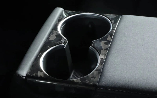 Carbon Fiber Cup Holder Cover for Tesla Model 3+ Highland 2024  is available at Ludicrous EV.