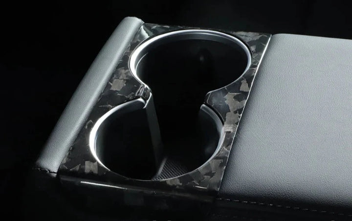 Carbon Fiber Cup Holder Cover for Tesla Model 3+ Highland 2024  is available at Ludicrous EV.