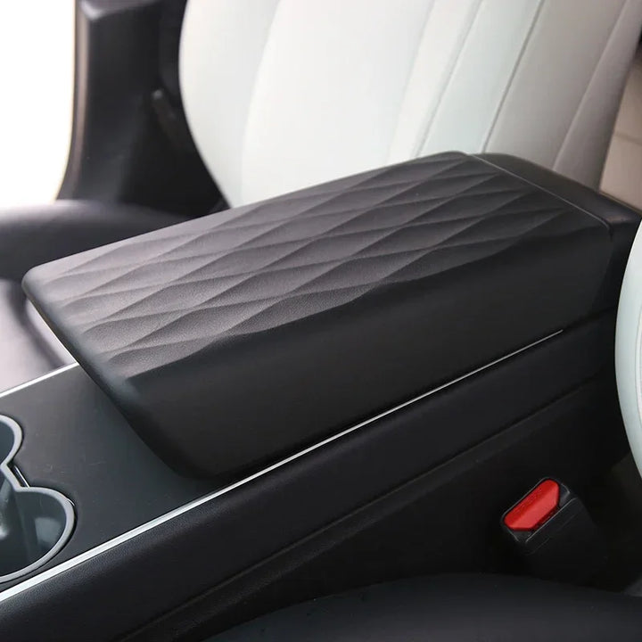 TPE Armrest Box Cover for Center Console – Protective Accessory for Tesla Model 3 Y which is available at Ludicrous EV.