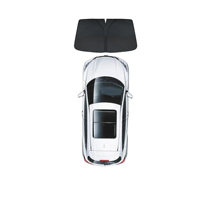 Car window sunshades installed on the interior windshield of a Tesla Model 3, showing the product in use within the vehicle's interior.