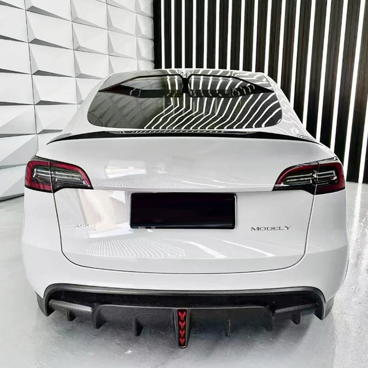 Performance Rear Diffuser with Pilot Light for Tesla Model Y (2021-2023) is available at Ludicrous EV.