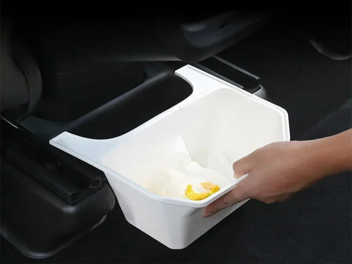 TPE Under-Seat Storage Box with Trash Can for Tesla Model Y 2021-2024 is available at Ludicrous EV.
