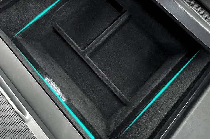 A black central control storage box designed for Tesla Model 3, featuring a flocked PVC interior and a turquoise trim.