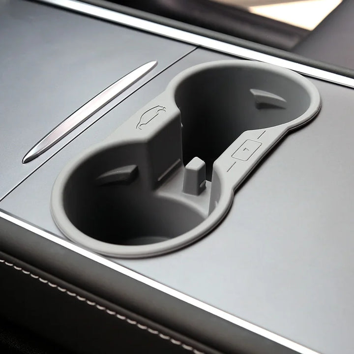 Silicone Non-Slip Cup Holder and Phone Limiter for Central Console for Tesla Model 3 Y 2021-2023 is available at Ludicrous EV.
