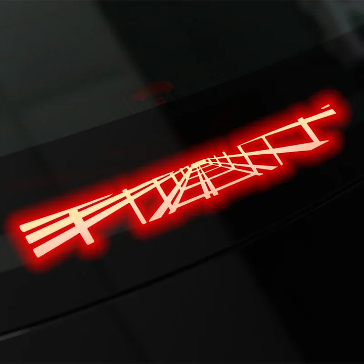 A collage of images showing brake light stickers for Tesla Model 3/3+ Highland. The stickers are displayed in red color with text and symbols, and are shown in various states of application including the packaging, the car trunk, and the vehicle itself.
