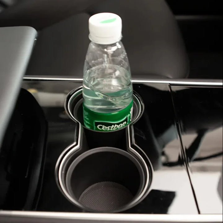 ABS Water Cup Holder Adapter for Tesla Model 3/Model Y Center Console is available at Ludicrous EV.
