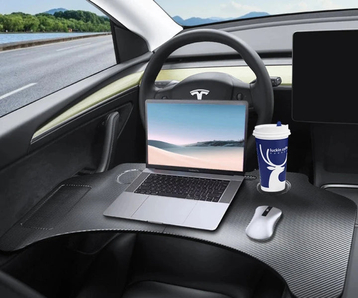 Portable Folding Steering Wheel Desk for Tesla Model 3/Model Y Highland 2024 is available at Ludicrous EV.
