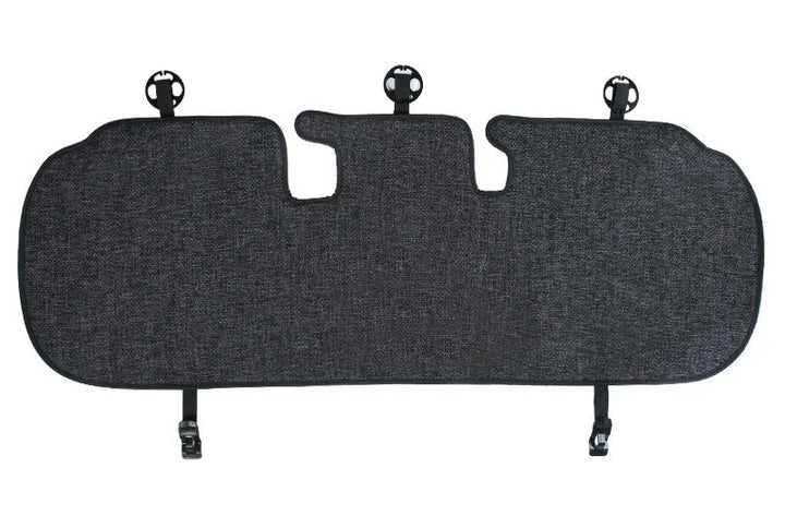 Flax seat pad covers installed on the front and rear seats of a Tesla Model Y, showcasing the product's design and fit.