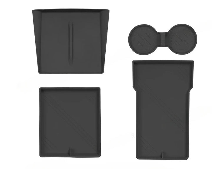 Set of silicone central control storage pads for Tesla Model 3, including a water cup mat, armrest box lower storage mat, and wireless charging pad with side pockets.