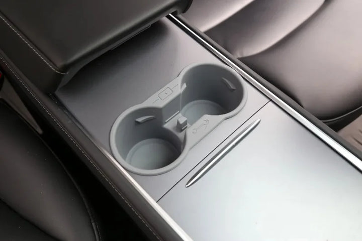 Silicone Non-Slip Cup Holder and Phone Limiter for Central Console for Tesla Model 3 Y 2021-2023 is available at Ludicrous EV.
