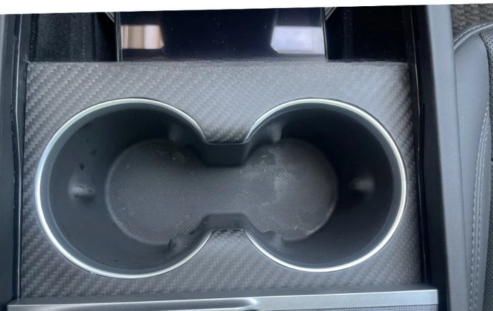 Carbon Fiber Cup Holder Cover for Tesla Model 3+ Highland 2024  is available at Ludicrous EV.