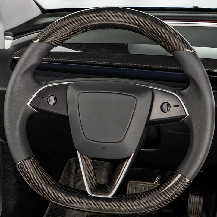 Real Carbon Fiber Steering Wheel Cover for Tesla Model 3+ Highland is available at Ludicrous EV.