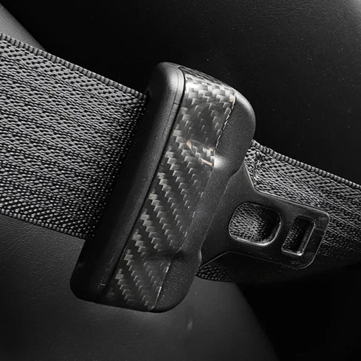 Real Carbon Fiber Seatbelt Buckle Covers for Tesla Model 3/Y is available at Ludicrous EV.
