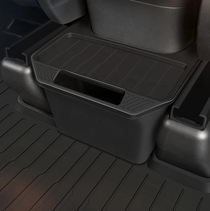 TPE Under-Seat Storage Box with Trash Can for Tesla Model Y 2021-2024 is available at Ludicrous EV.
