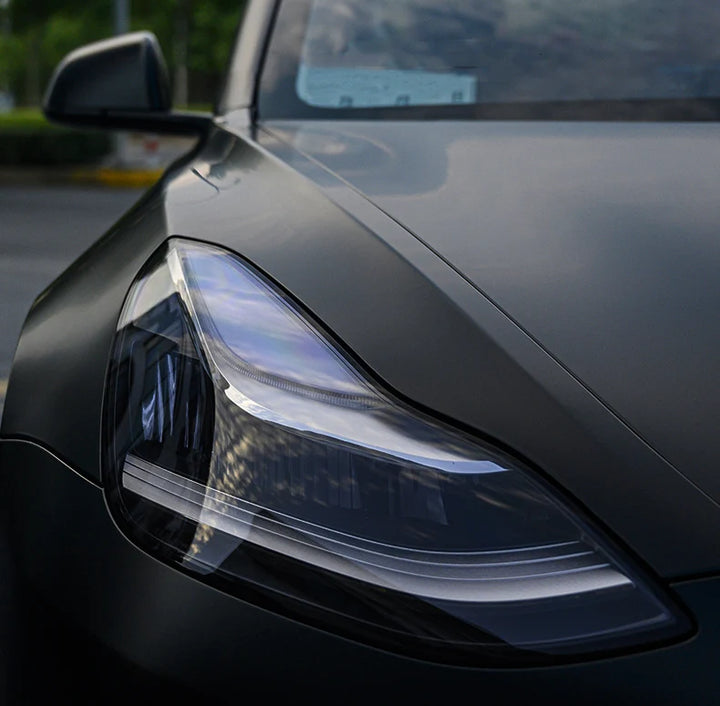 TPU Smoke Black Headlight Protector Film for Tesla Model 3/Y 2017-2022 is available at Ludicrous EV.