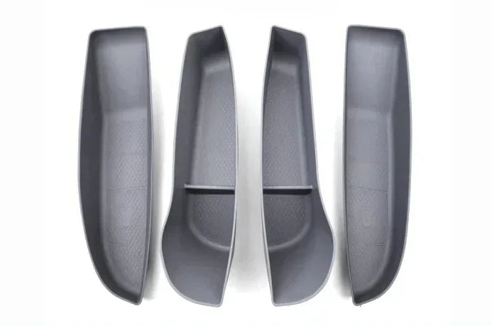 A black TPE door side storage box designed for Tesla Model 3, displayed next to the interior of the vehicle's door showing the product's placement and fit for the vehicle.