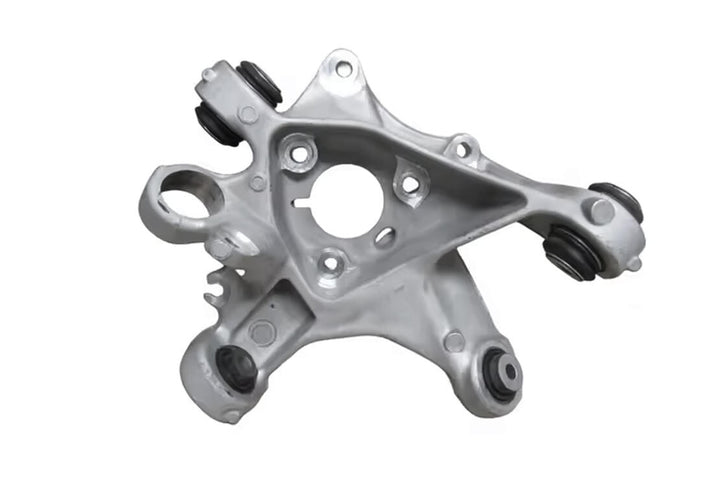 Wheel Suspension Steering Knuckle for Tesla Model 3 | VAICO V58-0253 is available at Ludicrous EV.
