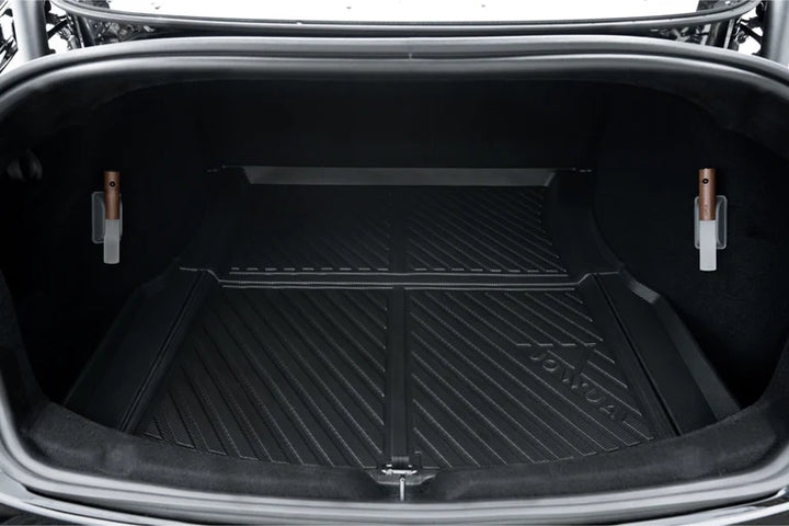 Close-up of Model 3 trunk liner in black car