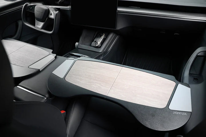 Foldable Car Tray for Tesla is available at Ludicrous EV.
